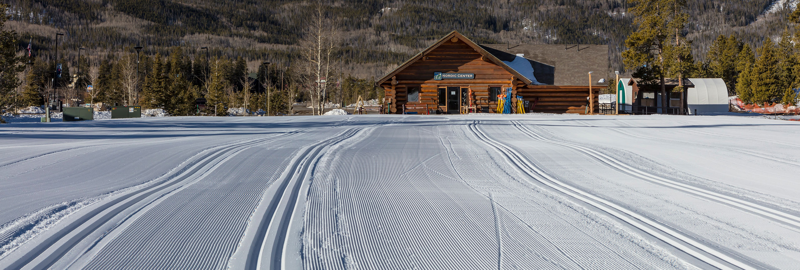 Freshly groomed learning area outside of the Nordic Center lodge. Peak One in the background.