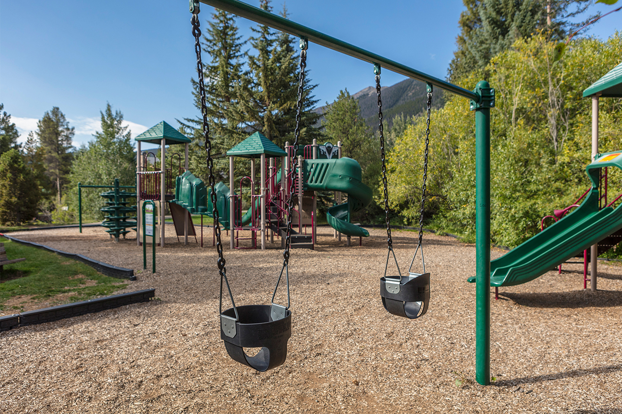 Swing set and playground at Walter Byron Park.
