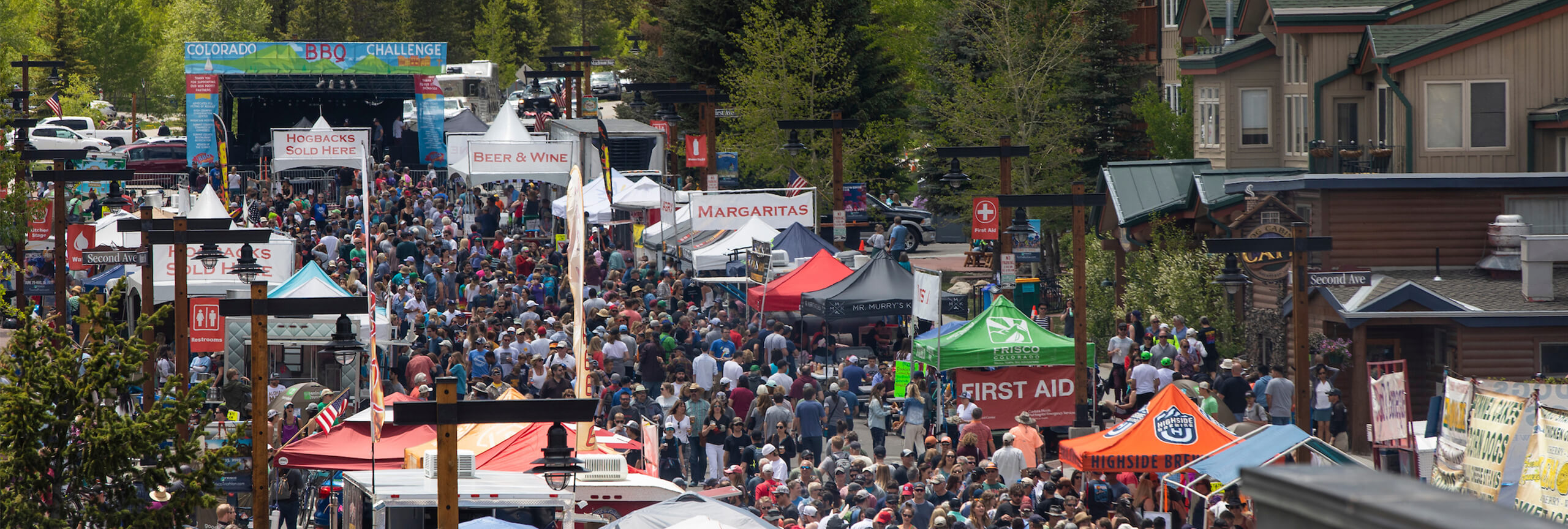 Street view of crowd of people at the Frisco BBQ Challenge