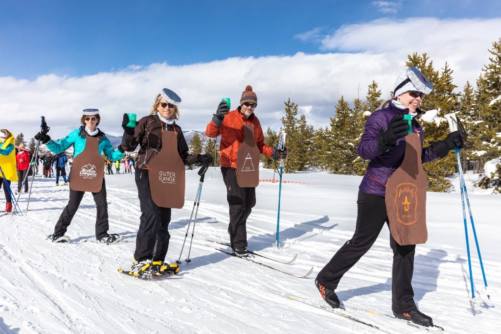 Group of cross country skiers dressed as beer bottles at Frisco BrewSki event