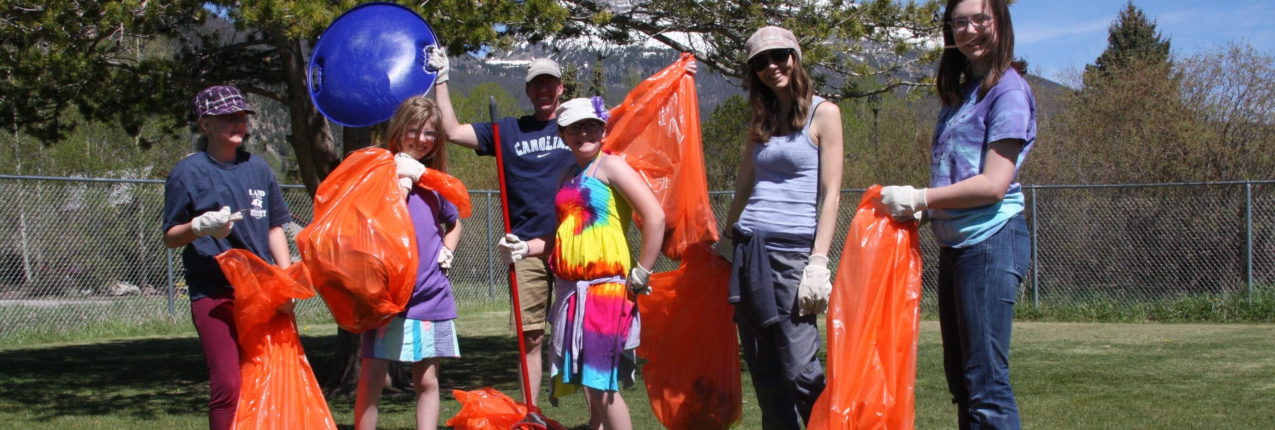 Group with trash and trash bags in Frisco on Town Clean Up Day
