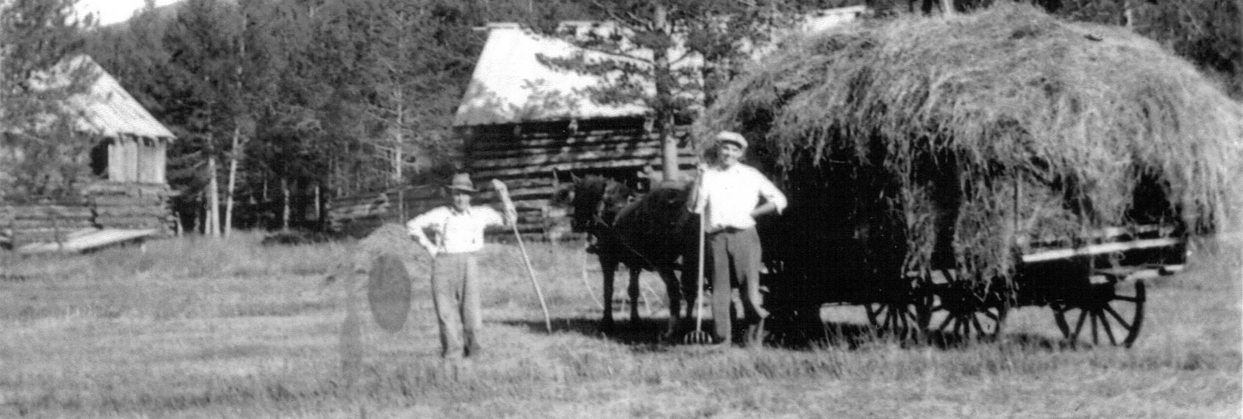 Historic photo of two men working on Bill's Ranch in Frisco