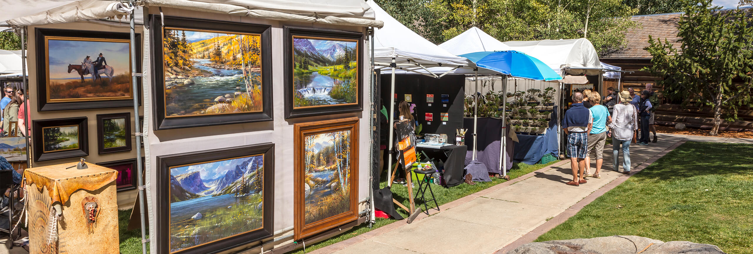 Artist booths set up in Frisco Historic Park at art show