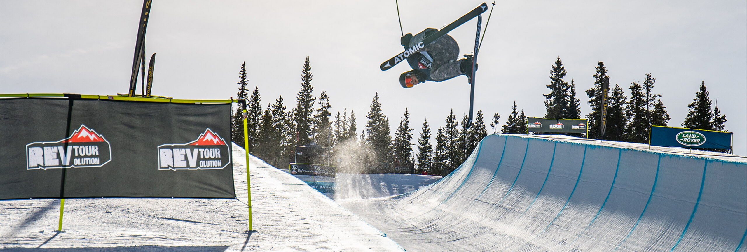 Skier doing trick in half pipe at U.S. Revolution Tour at Copper Mountain