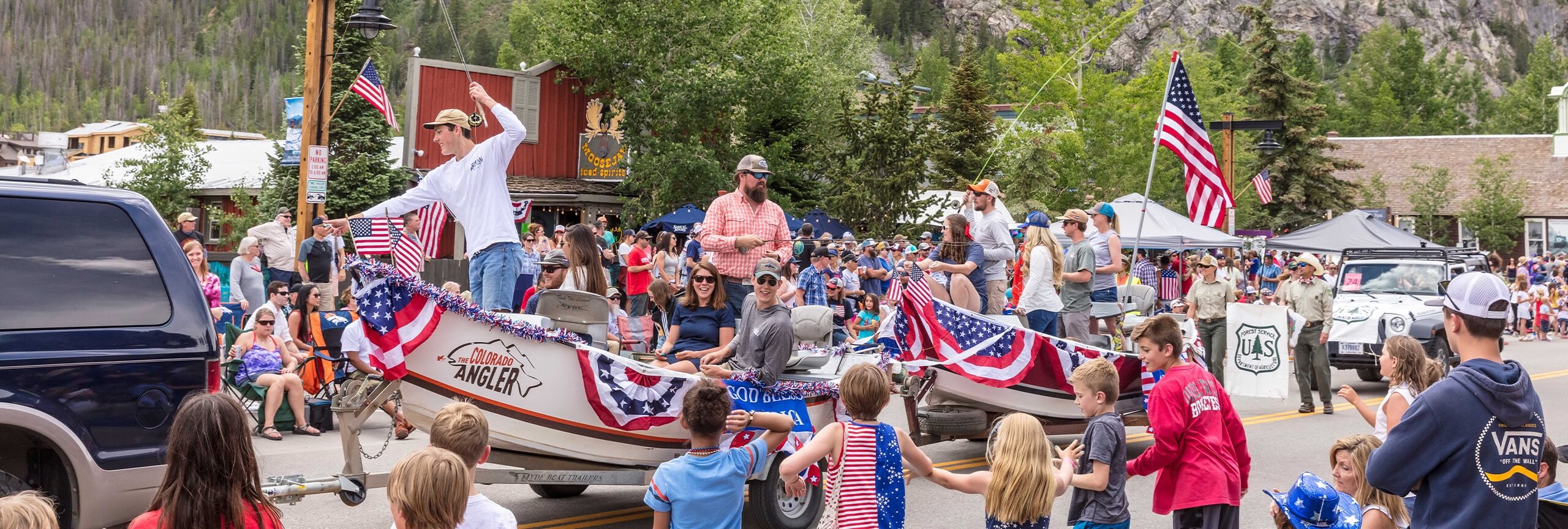 Frisco 4th of July parade with fishing boat float
